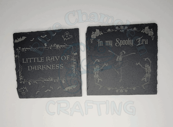 Copy of COMIC_20250902_102642_0000 Custom laser engraved stone coaster with spooky design on tabletop.